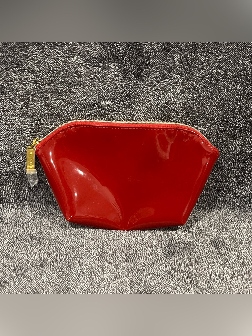 Estée Lauder cosmetic bag wine red patent
